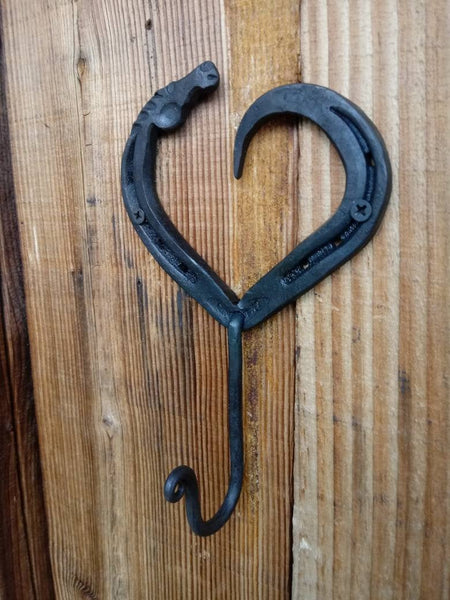 Horseshoe heart horse head hook, hand forged.