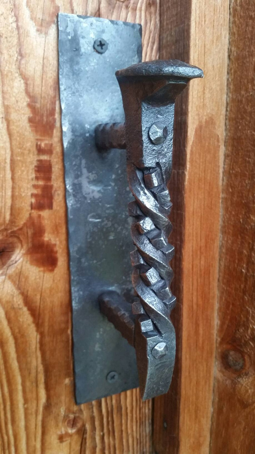 Hand forged railroad spike door handle cube twist